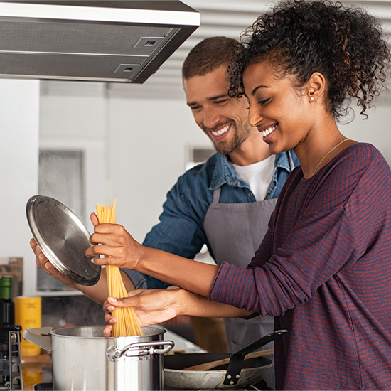 Couple making pasta