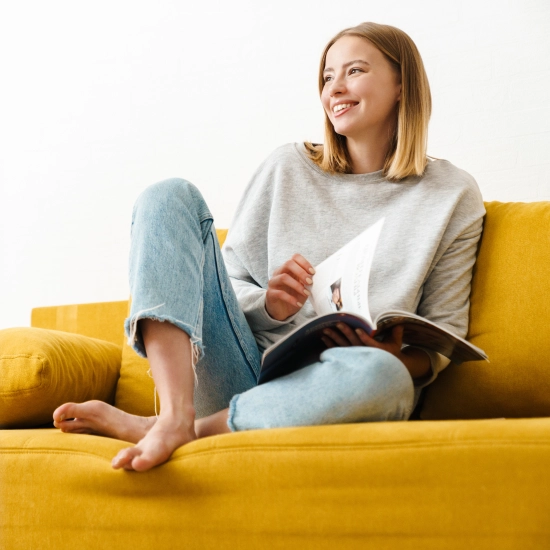 Women reading on their sofa