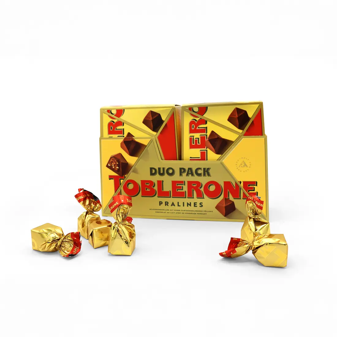 Conical carton sleeve for two Toblerone Pralines packs with die-cut windows, embossing and UV varnish, reflecting the iconic triangular shape.