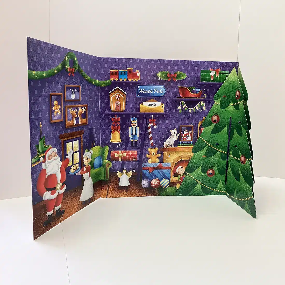 Milka Advent Calendar with 24 windows and foldable 3D tree, combining chocolate treats and paper ornaments for a playful holiday experience.
