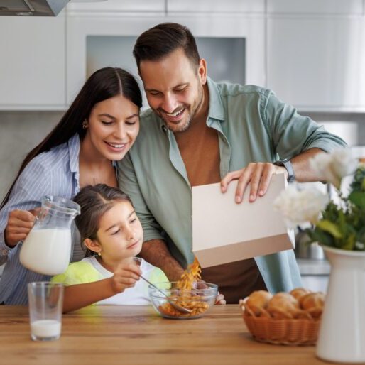 Family enjoying the breakfast with cereal cartonboard packaging